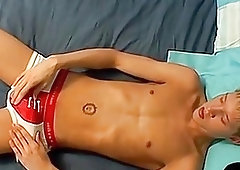 Emo gay teases himself through underwear before stroking his boner