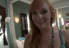 Gothic redhead Dani Jensen strips down to pantyhose before intimate bedroom encounter