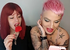 Tattooed Serbian redhead and pink-haired girl flirt on webcam from their living room