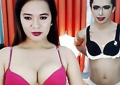 Naughty shemale babes take turns fucking each other on webcams