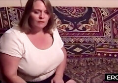 He pushes his hard cock between her huge breasts