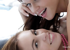 Two sweeties on a bed