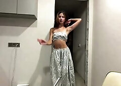 Stunning Brunette Model Teases in Sparkly Outfit