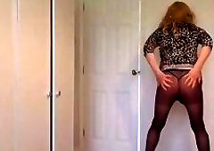 Black pantyhose, leopard print minidress and high heels