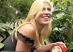 Naughty blond tranny exposes lil' tits and penis outdoors
