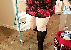 Large butt real estate agent in short mini costume doing property inspections with legs open - sexy big beautiful woman