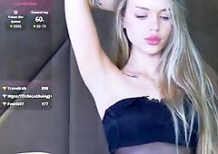 Stunning Blonde Model in Sheer Top Teasing on Bed