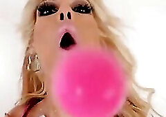 Flashy blond uber-bitch Bridgette B.'s taut, sexy-pink bikini looks incredible. That Babe shakes & sways in an epic, slow motion tease sequen