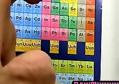 On a plush couch a cute couple engages in bareback sex