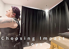 It's time for me to belt him down, expose his bum and use the paddle for some light strokes to his latex-clad and stripped bottom