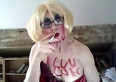 Slutty femboy slag Sarah smokes, writes on body, talks dirty, fingers her slag hole, wanks to cumsho