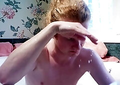 Redhead gay youngster enjoys a relaxing bath with a meatotomy twist