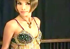 Victoria, posing in sequined lingerie