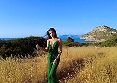 Brune solo girl climaxes on sunlit rocks by the Aegean Sea