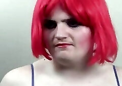 Bulky crossdresser drools and gags on a black tranny cock