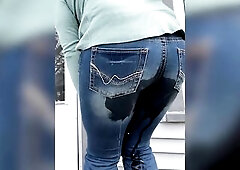 Leslie Oozes Wets Jeans outside