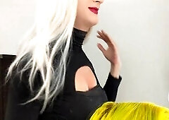 Crossdresser Bailey Wilde and a woman applying lipliner and lipstick together