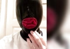 Warming up in my latex fuck-rubber hood