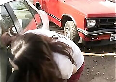 A youthful horny brunette hair sucks the penis of a lewd man previous to hawt screwing in the parking lot in different positions
