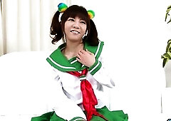 An handsome Oriental female displays her hairless pubic area publicly