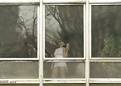 Jeny Smith the Ukrainian stuns in softcore tease through the window